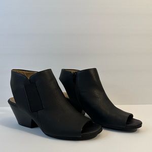 Black open toe ankle boots.
